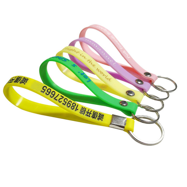 High Quality Bulk Cheap Custom logo Designer Rubber Bracelet Key Holder Silicone Wristband Keychain for Adult