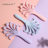 Brosse démêlante en ABS en forme de palmier unique avec picots ronds en nylon pour massage du cuir chevelu, outil de coiffure personnalisé avec logo, vente en gros