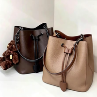 Sac seau en cuir d'occasion, sacs à bandoulière Entrupy authentifiés avec cordon de serrage, sacs de luxe d'occasion codés