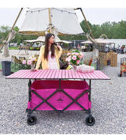 Chariot de camping pliable d'extérieur avec grande table métallique, roues tout-terrain et rangement intégré