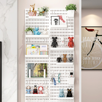 Panneau perforé décoratif multifonctionnel et élégant en PP, idéal pour salle de jeux, chambre à coucher et accessoires multiples