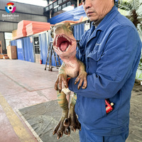 Marionnette de dinosaure animatronique réaliste, jouet d'intérieur le plus populaire pour les enfants, pour les centres commerciaux, les parcs d'aventure, les aéroports, les garderies