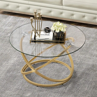 Table centrale ronde d'art avec dessus en verre antidéflagrant Table basse luxueuse de style nordique en métal doré/argenté