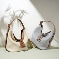 Sac seau bandoulière en cuir véritable haut de gamme pour femme 2026, grande capacité, style décontracté, avec rabat et design imperméable