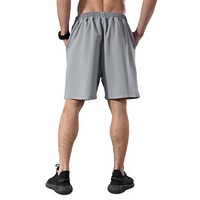 Shorts de boxe unisexe en polyester/coton léger, coupe ample, taille élastique avec cordon de serrage, pour entraînement de combat et arts martiaux