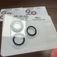Protecteur de module caméra 3D électroplaqué avec base en PMMA transparent et verre optique pour iPhone séries 13-17