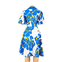 Gaun pesta wanita ukuran besar model A-line berbahan voile spandex dengan motif bunga manis, kerah O-neck, panjang lutut, dan saku.