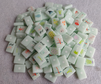 Jeu de tuiles de mahjong de luxe inspiré du verre marin, style côtier américain, avec motifs Vents de marée haute, Dragons requins taureaux, Dauphins et Jokeres coquillages.