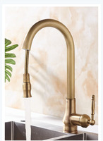 Robinet de cuisine européen monocommande en laiton avec douchette extractible, finition bronze antique, installation monotrou pour usage commercial