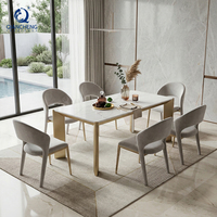 Foshan fabricant vente directe de luxe personnalisé marbre roche dalle table à manger ensemble nouveau Design SS métal meubles de salle à manger