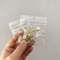 Pochette auto-adhésive transparente en PVC perforée pour rangement de bijoux, protection et étiquetage, emballage personnalisé pour bijoux