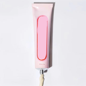 Crema Hidratante Facial Tópica Rosa en Tubo para el Cuidado Facial con Diseño Ovalado Rojo y Punta Aplicadora de Madera - Product Image 1