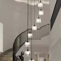 Lustre d'escalier long LOFT Duplex Entrée Luxe Nordique Moderne Simple Villa Salon Cyber Célébrité Lampe à cristaux rotative