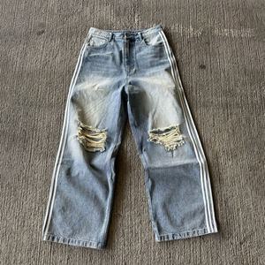 กางเกงยีนส์ผู้ชายไซส์ใหญ่ แต่งแถบข้างประดับคริสตัล สไตล์ซันเฟด แอซิดวอช ทำสีซีดแบบดิสเทรส ผ้าเดนิมคอตตอน 100% สำหรับผู้ชาย ขายส่งแบบสั่งทำได้ - Product Image 1