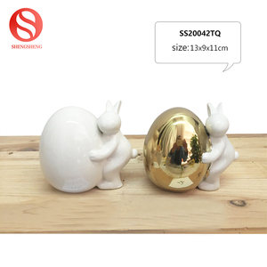 New design ceramic rabbit white desk's Home Decoration embrace the golden egg - Product Image 2