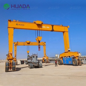 رافعة جسرية ديزل 90 طن بإطارات مطاطية مع وحدة تحكم منطقية قابلة للبرمجة وصندوق تروس للرفع المستقر في مراكز الخدمات اللوجستية - Product Image 1