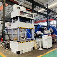 Presse hydraulique à quatre colonnes et trois poutres 315T, moteur servo PLC 15 kW, automatique
