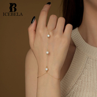 Élégant bijoux fins bague main chaîne ensemble perle Zircon étoile quatre pétales fleur 925 bague en argent Sterling chaîne Bracelet pour les femmes