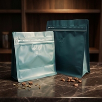 Sacs d'emballage pour grains de café en plastique Mylar, nouveau design personnalisé, à fond plat, avec fermeture éclair de sécurité et impression sérigraphique, 250g/1kg
