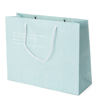Sacs cadeaux en carton écologiques et durables avec logo personnalisé imprimé, poignées longues, pour cosmétiques, en papier couché, vente chaude en gros