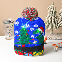 Decorazione della festa di natale ha portato i berretti di Babbo Natale con luce calda lavorata a maglia cappellino per adulti cappelli natalizi con luce a Led