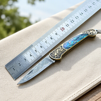 Couteau de survie pliant d'extérieur, couteau de poche pliant en acier Damas, couteau de survie en milieu sauvage, manche en laiton Baobei Shell