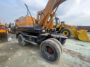 Excavatrice sur pneus Hyundai 150W-9 d'occasion, faible nombre d'heures de fonctionnement, 15 tonnes, provenance Corée, avec coupleur rapide et brise-roche, certifiée CE - Product Image 4