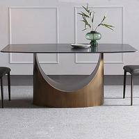 Base de table en acier noir industriel au design distinctif, finition laiton antique, pour table à manger