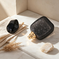 Flacon de parfum vide 50 ml, texture cuir craquelé, verre gris foncé avec bouchon noir poli, livraison directe d'usine