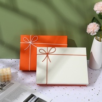 Boîte cadeau rigide bicolore orange crème Shaher avec nœud en cordon, texture lin, emballage rectangulaire personnalisable pour anniversaire et mariage