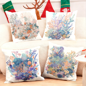Colorful coral reef throw pillows decorate cozy living room with festive holiday stockings and reindeer antlers - Product Image 1