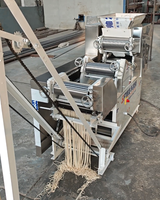 Machine à rouler, à aplatir et à couper la pâte, pour la fabrication de nouilles sèches suspendues et les équipements de mouture de céréales