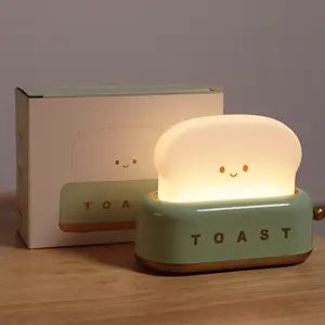 Factory Price Home Decoration Bread Emotion Small Night Light Outdoor Lighting Baby Sleeping Eye Care LED Toast Table Lamp