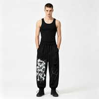 Pantalon baggy streetwear à cordon de serrage, multi-déchirures sur la cuisse, avec imprimé Kornit DTG Drip Splash All Seeing Eye Bone Rhinestone Line