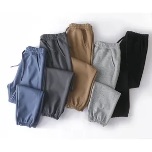 Pantalon long de survêtement en coton avec logo personnalisé Pantalon de jogging surdimensionné pour hommes Pantalon de jogging avec impression vierge d'usine