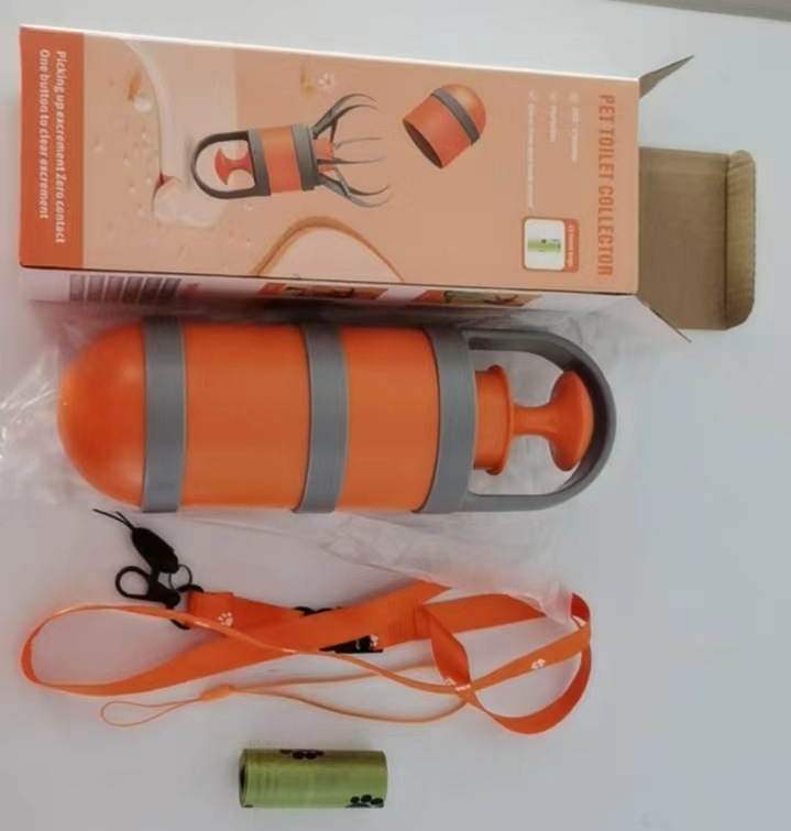Pala recogedora de arena para gatos con embalaje en inglés.