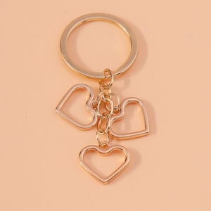 Porte-clés en forme de cœur ajouré simple et élégant Wenys, cœur en alliage, accessoire de <span class=keywords><strong>d</strong></span>écoration à suspendre au dos des livres - Product Image 6