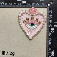 2025 nouveau Design perlé Appliques coeur yeux mauvais yeux à la main perlé perle cristal verre brodé patchs pour vêtements