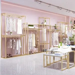 Vierkante Gouden Metalen Retail Kleding Display Rack Winkelinrichting Kleding Display Floor Type Kledingstuk Boutique Kleding Rek Met Plank