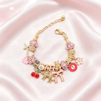 Bracelet porte-bonheur plaqué or tendance avec breloques croix, cerise, léopard, nœud, 7 fleurs rouges et étoile, bijou porte-bonheur