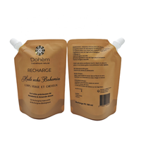 Emballage personnalisé en feuille d'aluminium estampé en or pour jus de fruits parfum boissons eau minérale sacs à bec en plastique pochettes