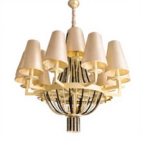 Lustre de luxe de style américain moderne en acier inoxydable doré et cristal K9 avec base d'ampoule E12 pour la décoration d'hôtels et de villas