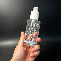 Flacon cosmétique de luxe en PETG de 90/100/120 ml avec pompe et bouchon sérigraphié pour sérum de soin de la peau