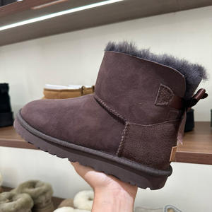 Bottes de neige en cuir <span class=keywords><strong>Uggs</strong></span> tendance 2026 avec nœud papillon pour enfants, filles et femmes – Vente en gros - Product Image 1