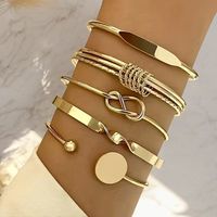 Lot de 5 Bracelets Joncs Brillants en Alliage Plaqué Or avec Cœur et Croix Minimalistes, Ornés de Zircons – Idéal pour les Fêtes