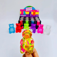 Vente en gros : Ours anti-stress souple scintillant effet aurore, motif vortex, emballé en boîte colorée