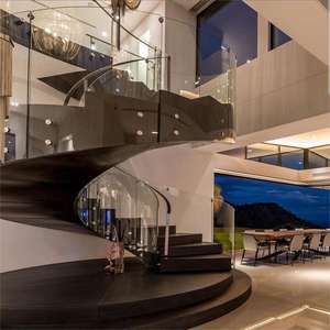 Современная Роскошная изогнутая стальная лестница индивидуальная мраморная лестница со стеклянным ограждением для квартиры - Product Image 2