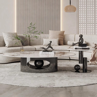 Ensemble de tables basses ovales de luxe moderne avec structure en acier inoxydable et plateau en pierre frittée pour salon et villa