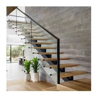 Escalier résidentiel en acier moderne avec marches LED intelligentes, design en L, marches flottantes intelligentes