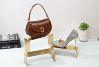 Présentoir à chaussures en acier inoxydable doré, robuste, écologique, moderne, de luxe léger, en forme de U, pour articles haut de gamme, très vendu